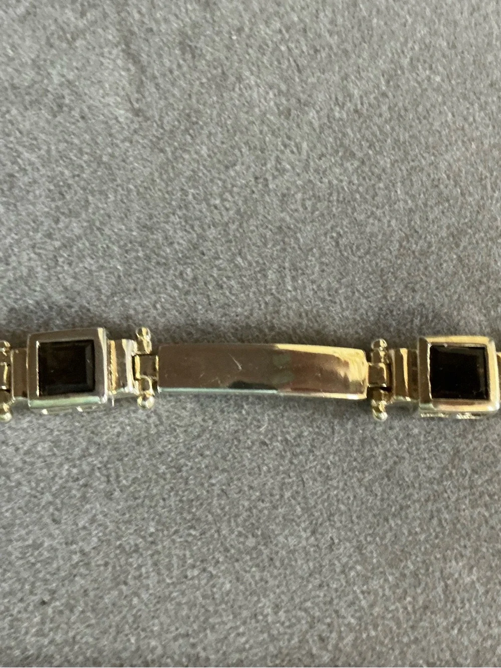925 Silver Bracelet with dark stones.
